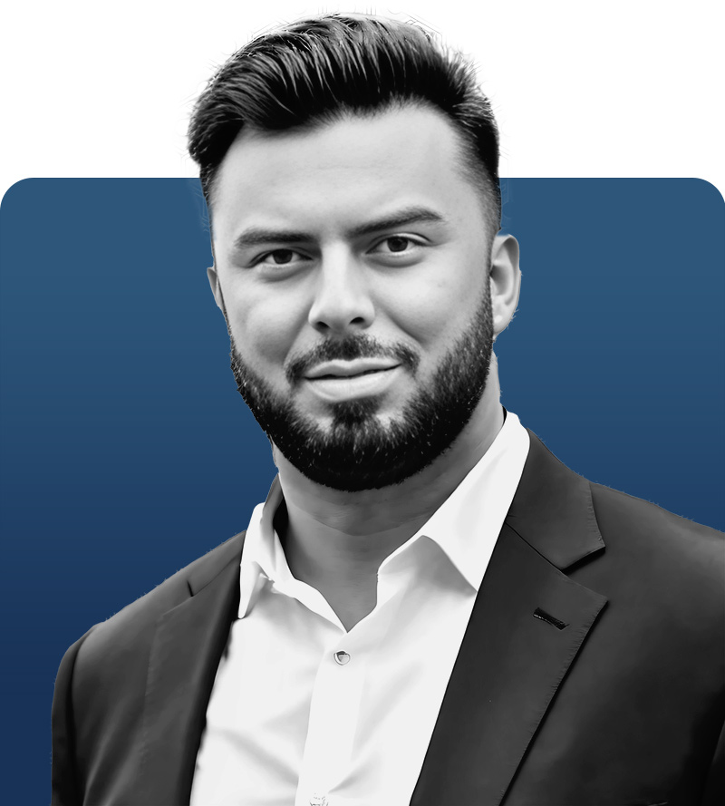 Johnny Casidos the Director of Construction for UPM Mechanical shown in black and white